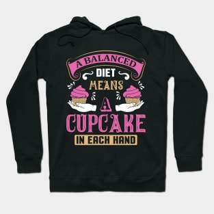 A balanced diet means a cupcake Hoodie